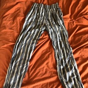 Puffy stripped pants w a tie at the bottom